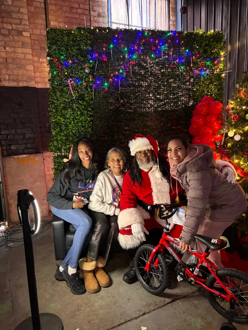 Families and community members at the Toys for Tots 2025 holiday event